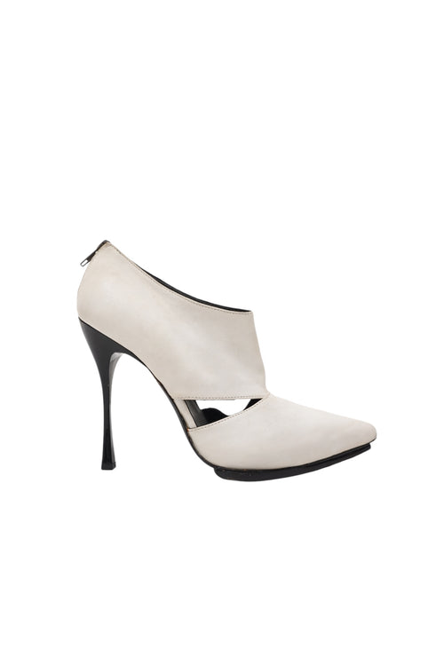 White high-heeled shoe on a white background