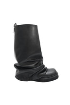 Black leather boot on a white background