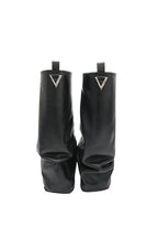 Black rain boots with a brand logo on a white background