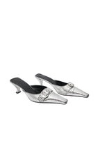 Pair of silver glittery high-heeled shoes on a white background