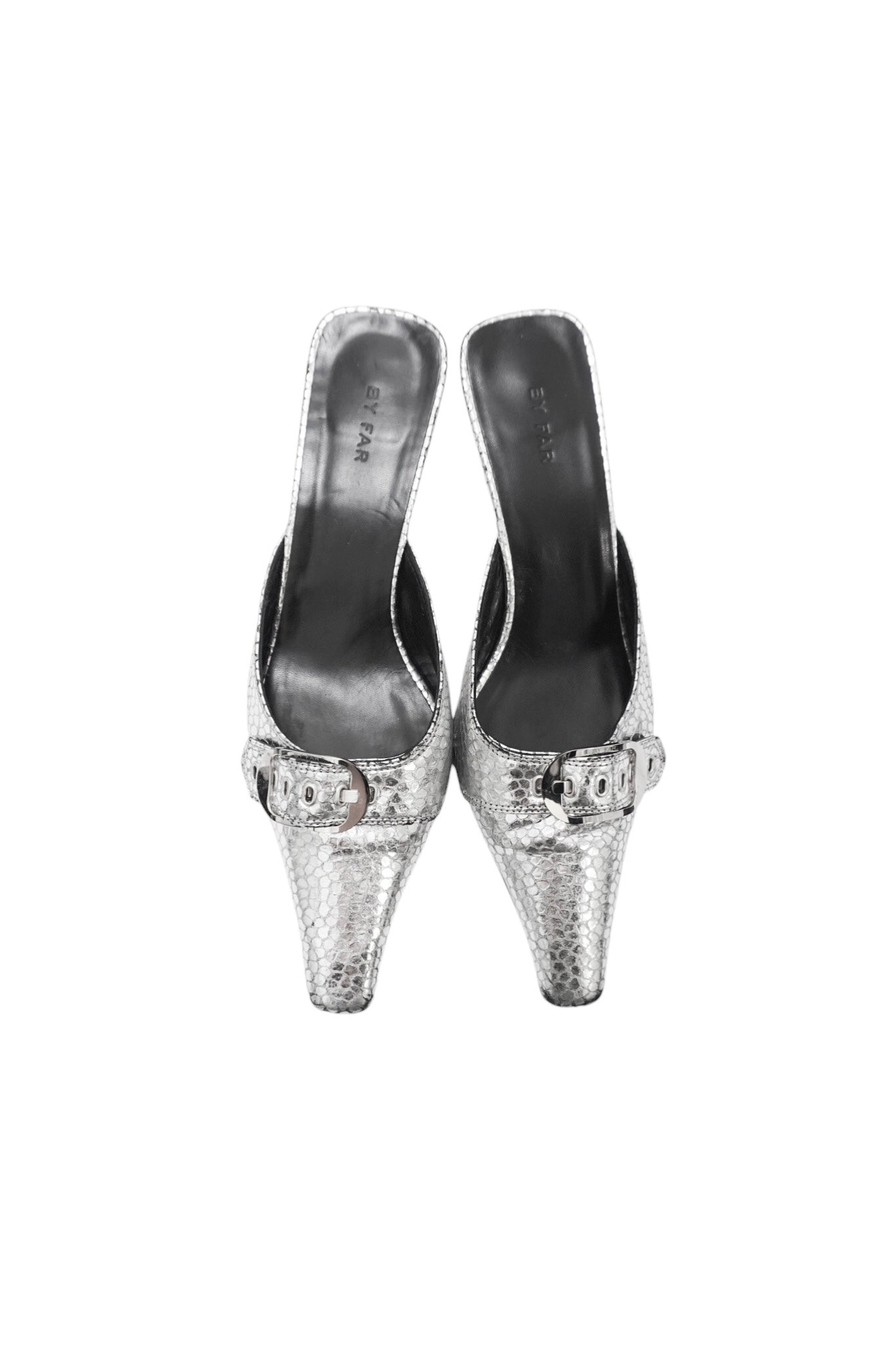 Pair of silver high-heeled shoes with embellishments on a white background