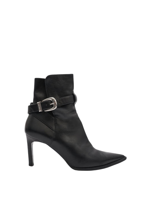 Black high-heeled ankle boot with a buckle on a white background