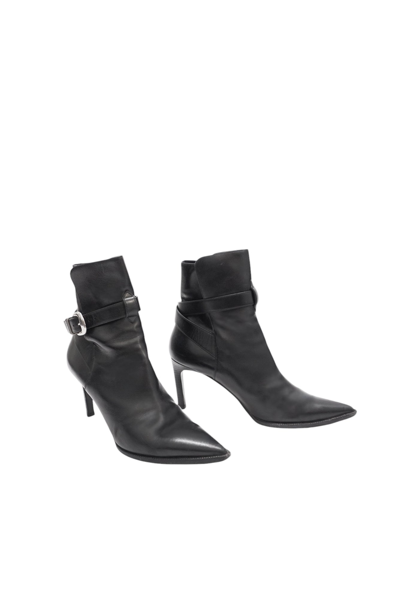 Pair of black high-heeled ankle boots on a white background