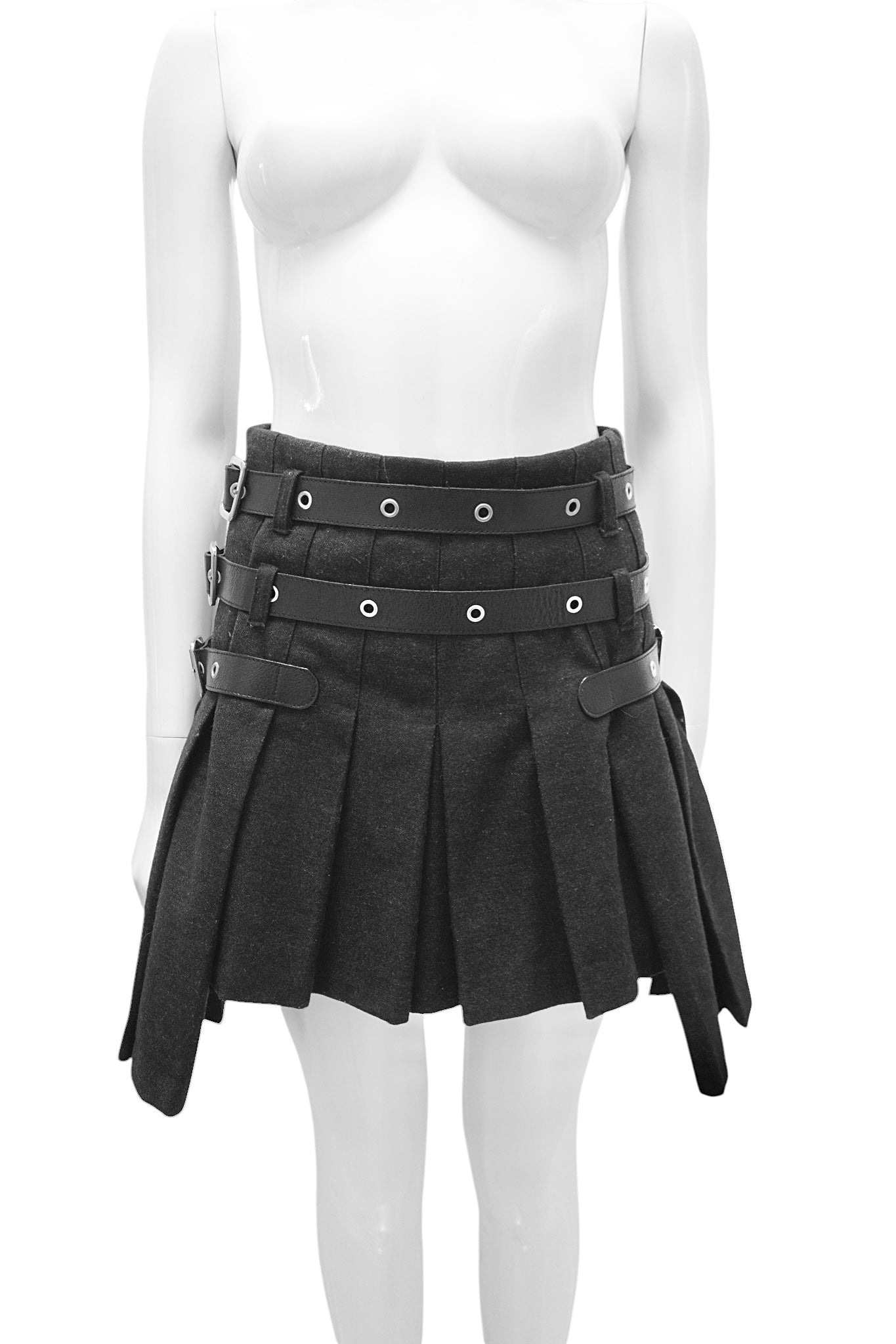 Black pleated skirt with belt and grommets on a white mannequin