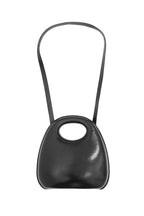 Black handbag with a strap on a white background