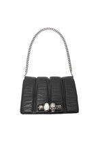 Black handbag with chain handle on a white background