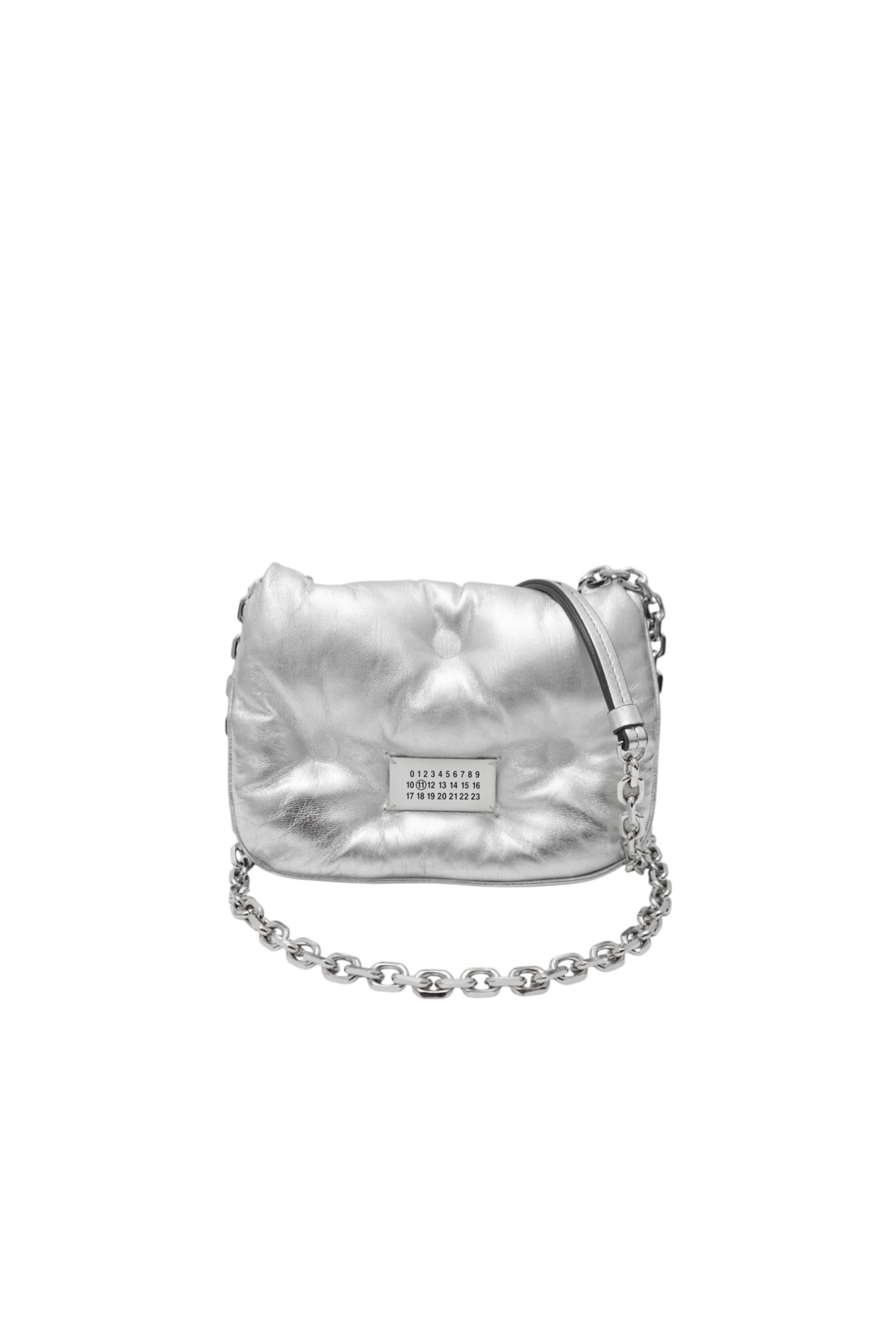 Silver handbag with chain detail on a white background