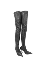 Black leather thigh-high boots on a white background