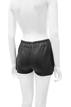 Black shorts on a mannequin against a white background