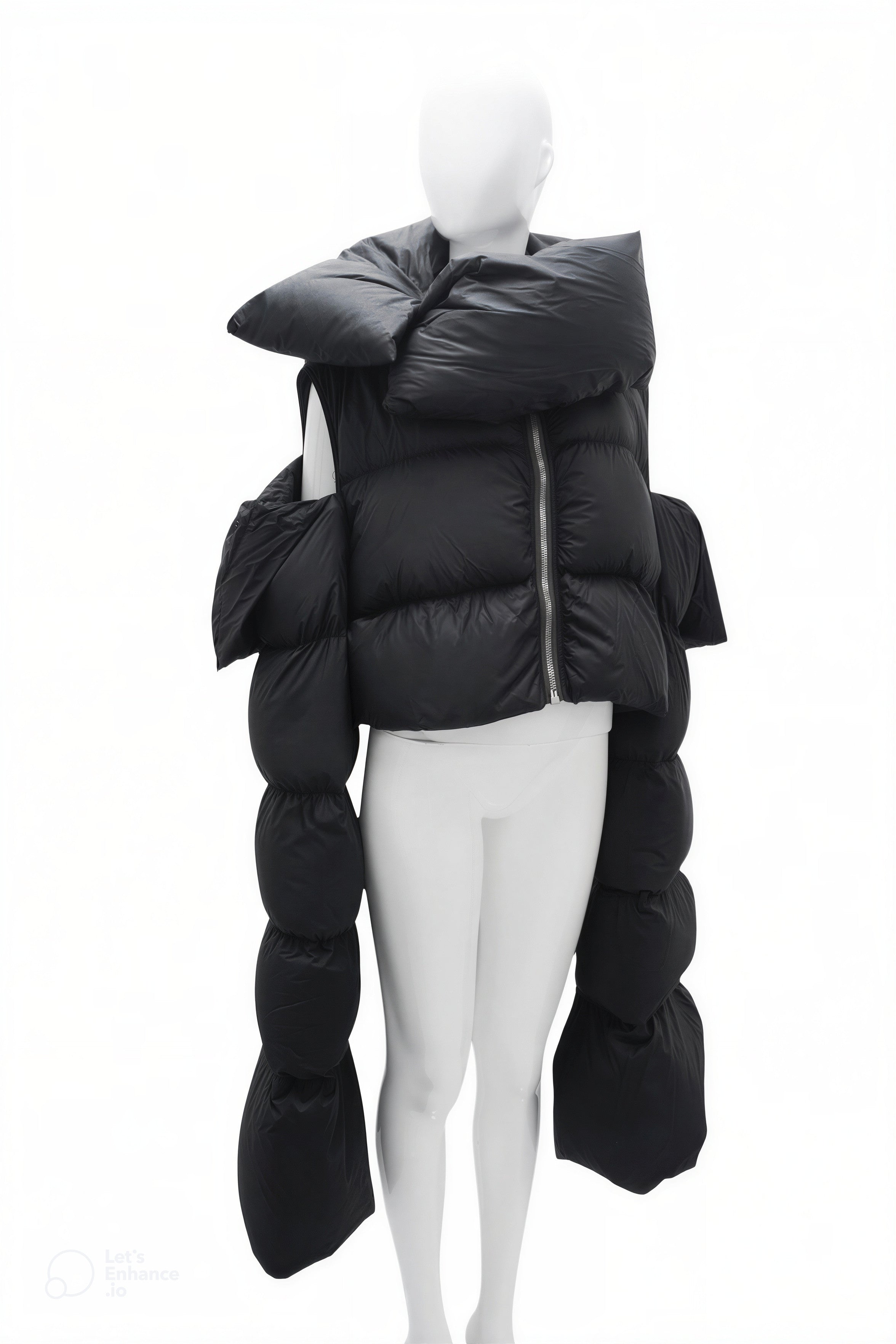 Mannequin wearing a black puffer jacket on a white background