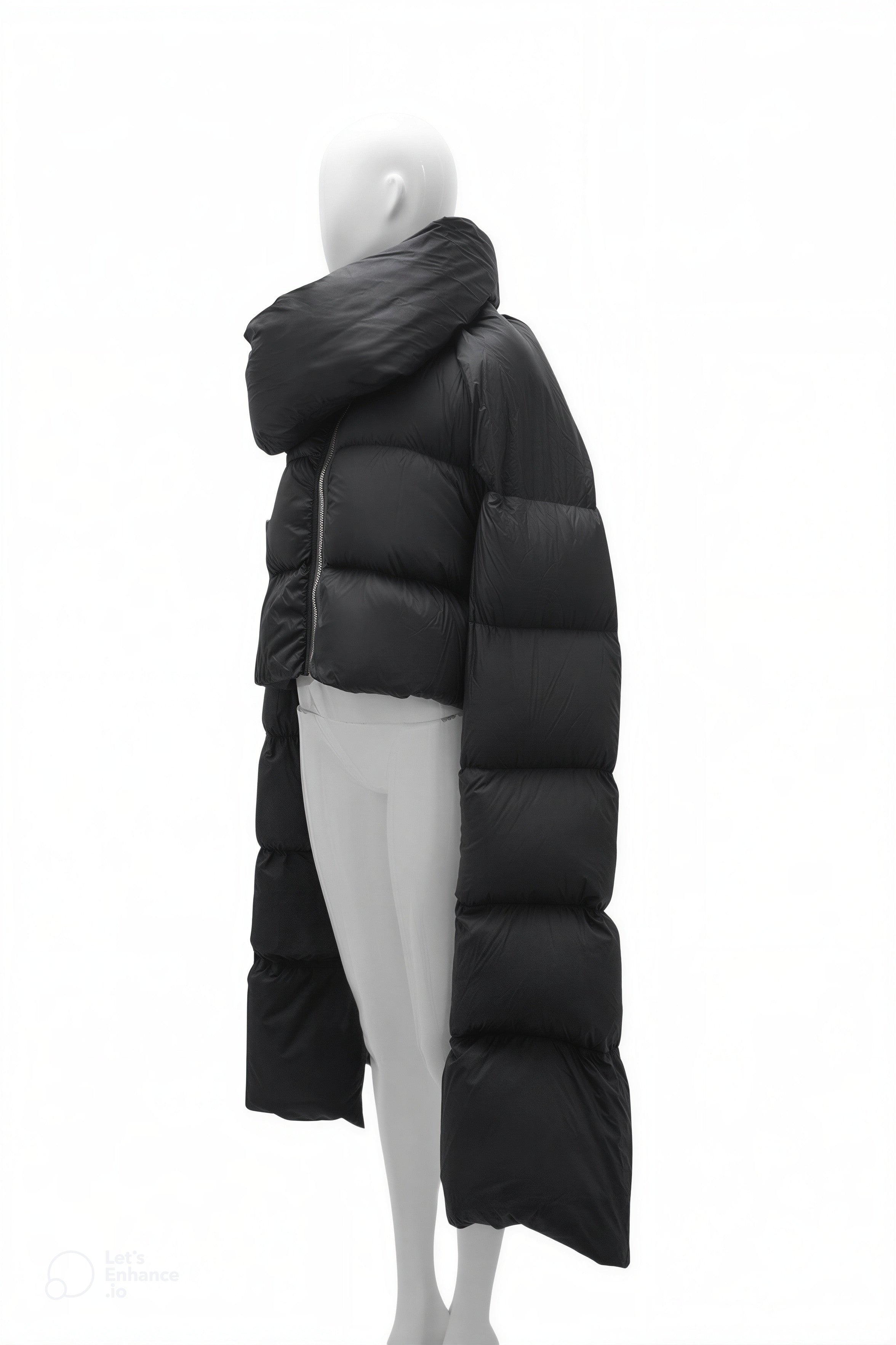 Black puffer coat on a mannequin against a white background