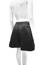 Black shorts on a mannequin against a white background