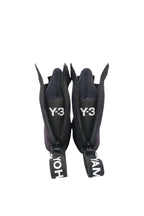 Black zippers with Y-3 branding on a white background